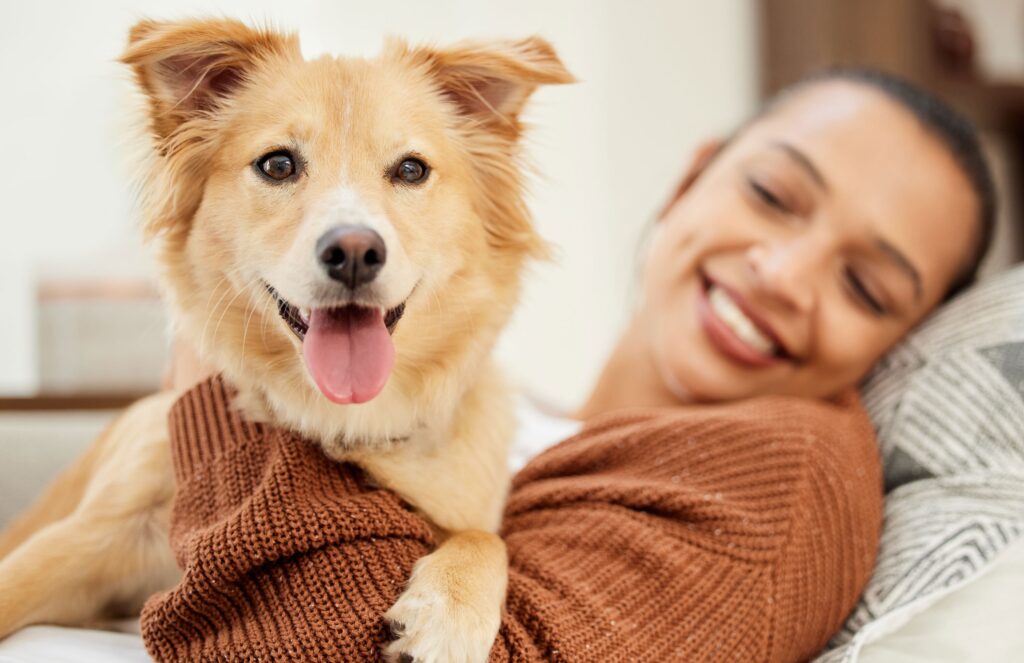 mixed breed dog and woman for best dog dna test kit