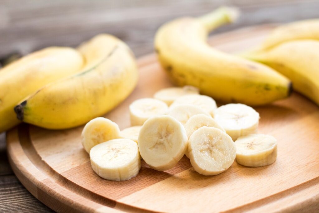cutting board of bananas
