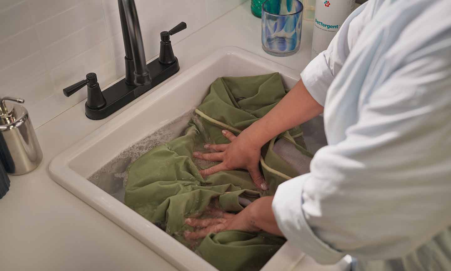 hand washing a dog bed