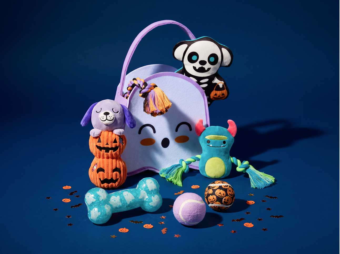 A dog boo basket filled with toys and treats